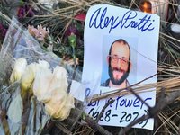 An image of a memorial for Alex Pretti, fatally shot by an ICE agent in January 2026.