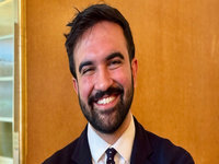 A portrait photo of NYC Mayor Zohran Mamdani.